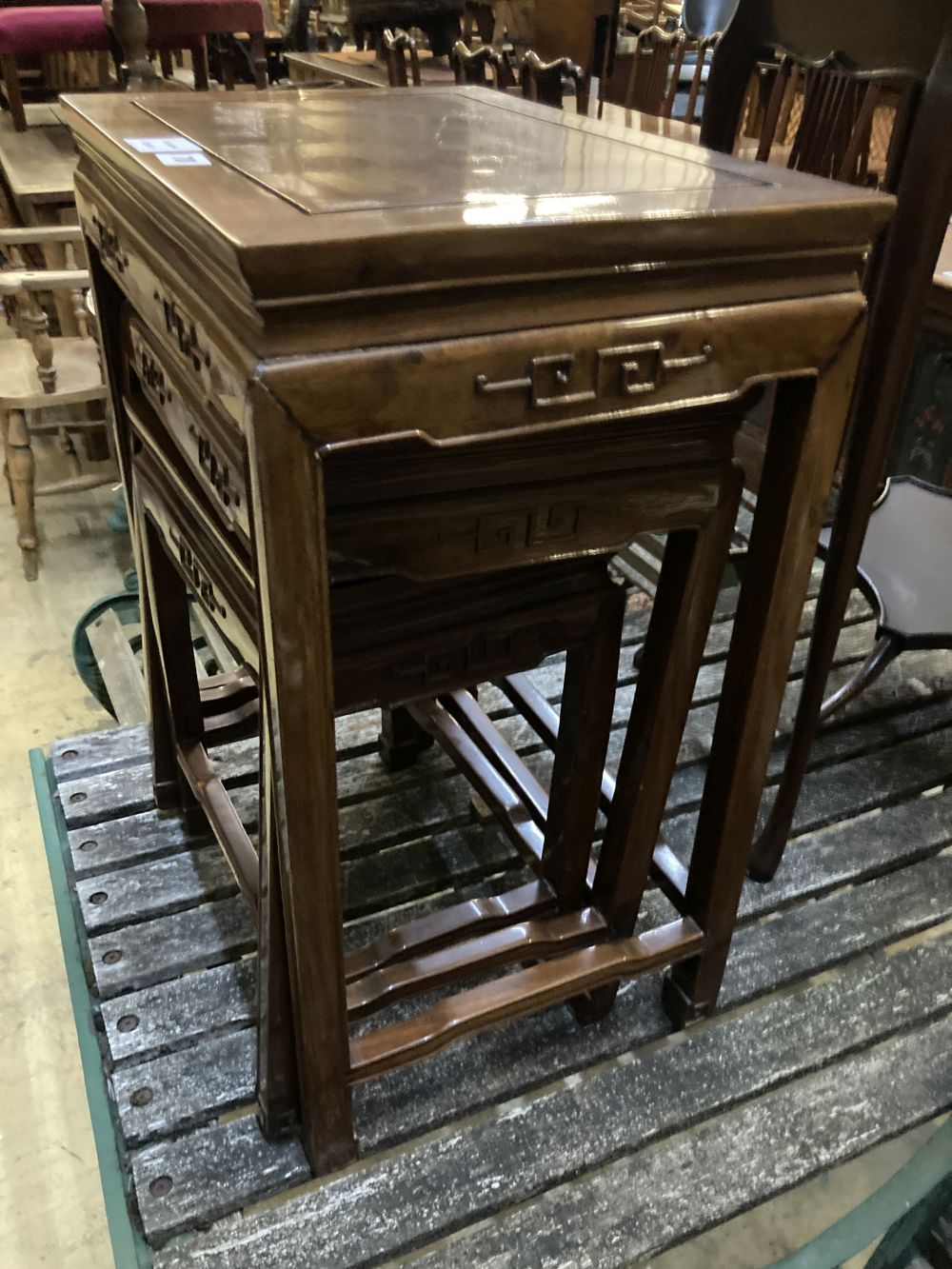 A nest of three Chinese hardwood occasional tables, largest 45 x 31cm height 59cm